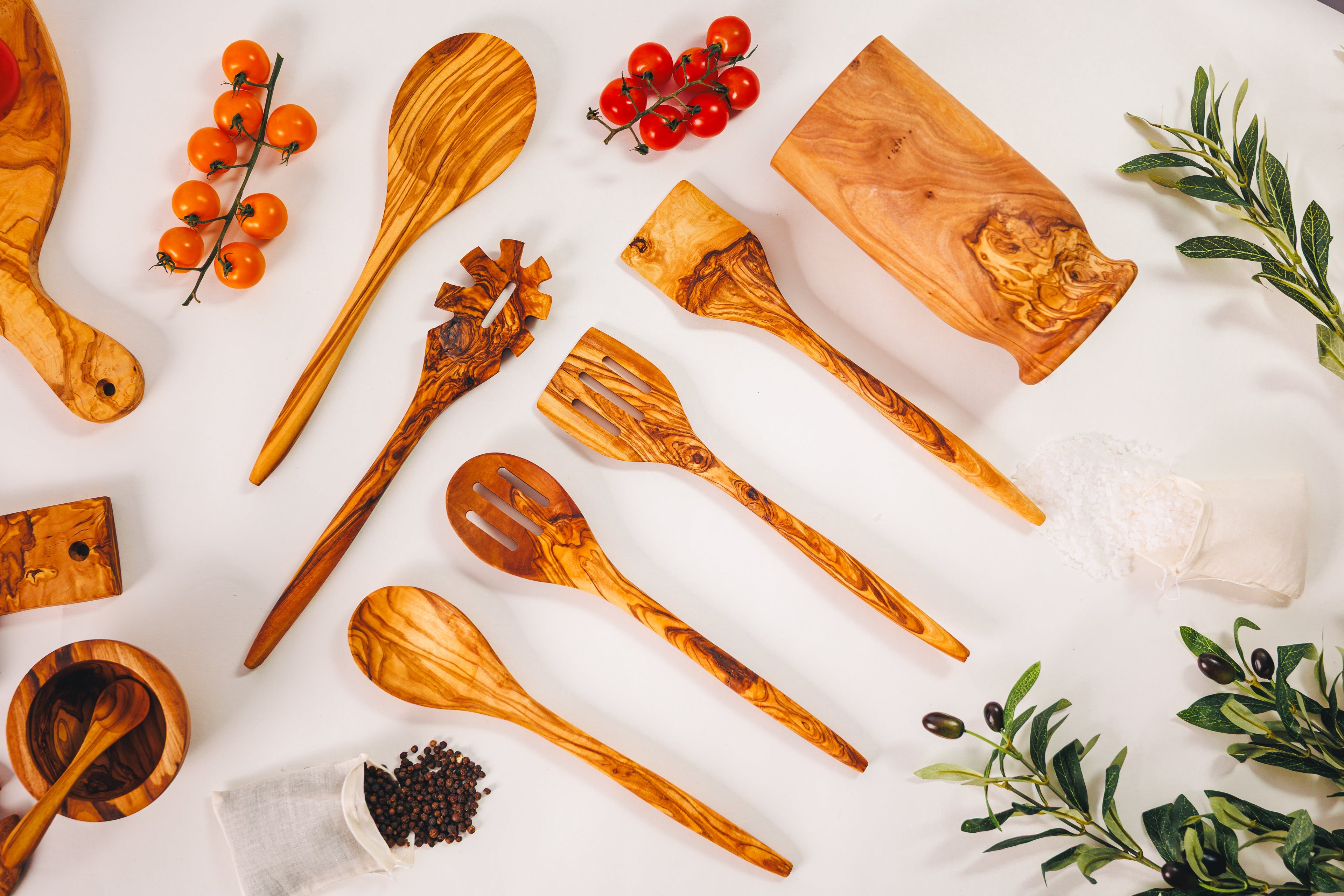 Full 6-piece handcrafted olive wood utensil set including spatulas, spoons, and a pasta server.