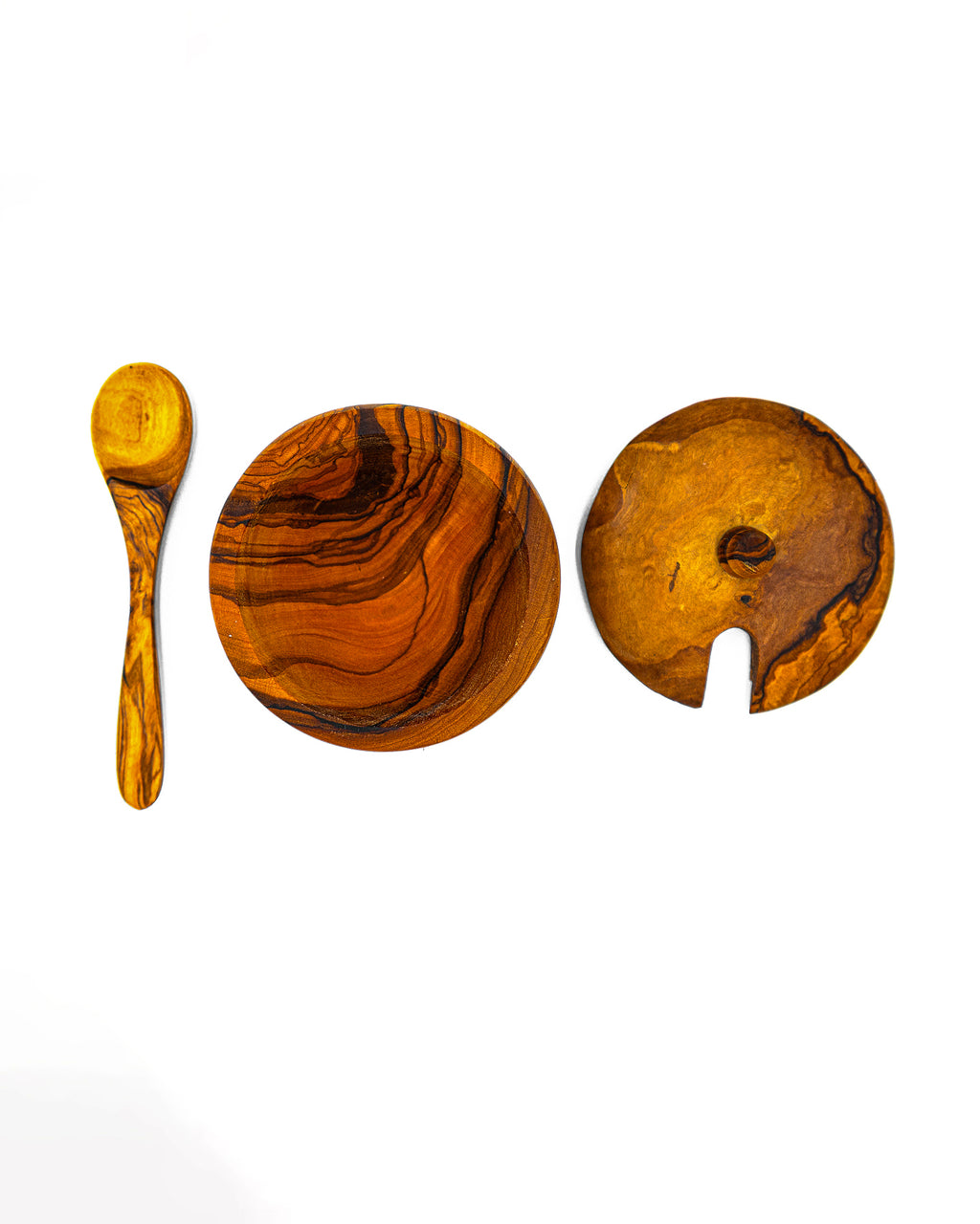 Flat lay view of the three components of a Willow and Spoon salt cellar: the bowl, the swivel lid, and the mini spoon.