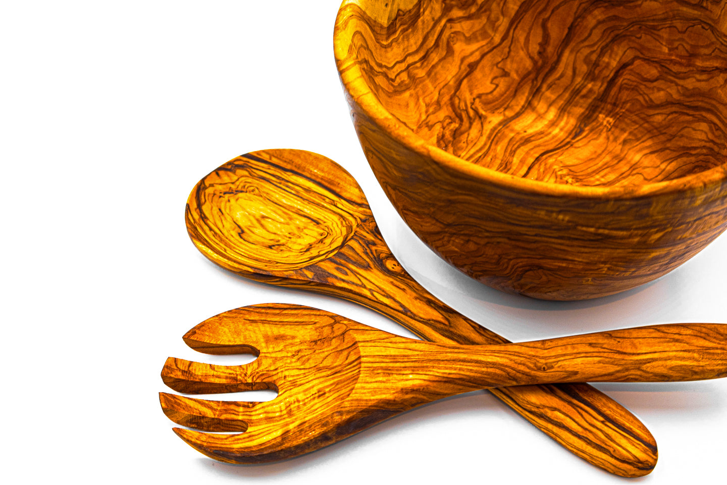 Side view of a 3-piece hand-carved olive wood salad serving set on a white background, perfect for rustic kitchen decor.