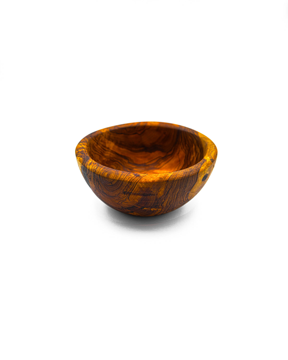 Side view of an individual olive wood prep bowl highlighting its sturdy construction and organic shape.