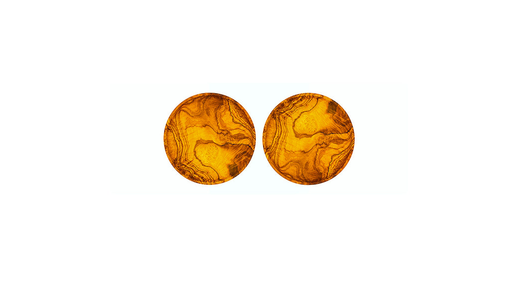 Set of two circular olive wood appetizer plates with unique swirling grain patterns on a white background.