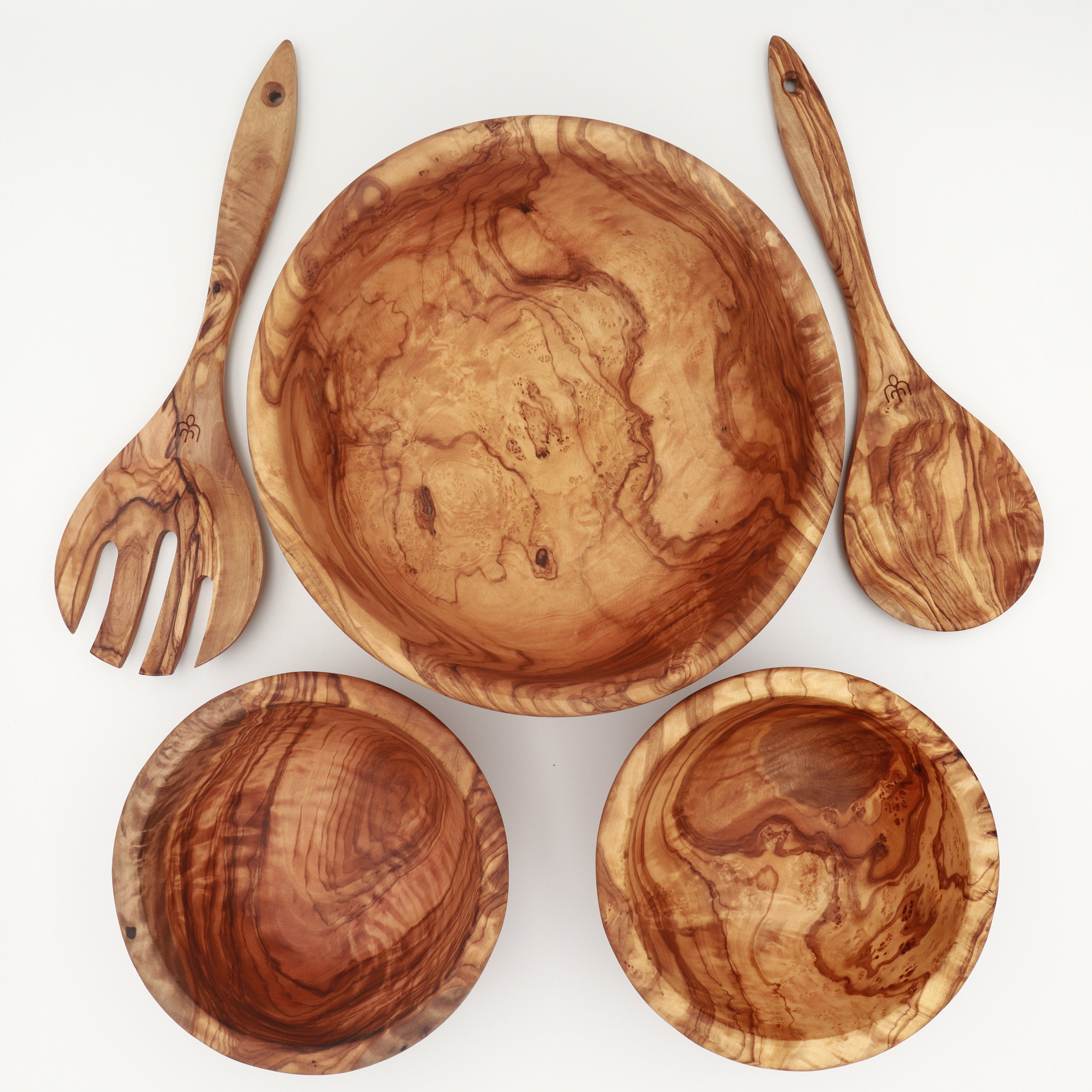 Handcrafted Tunisian olive wood salad set with large serving bowl, two salad servers, and two side bowls on white background.