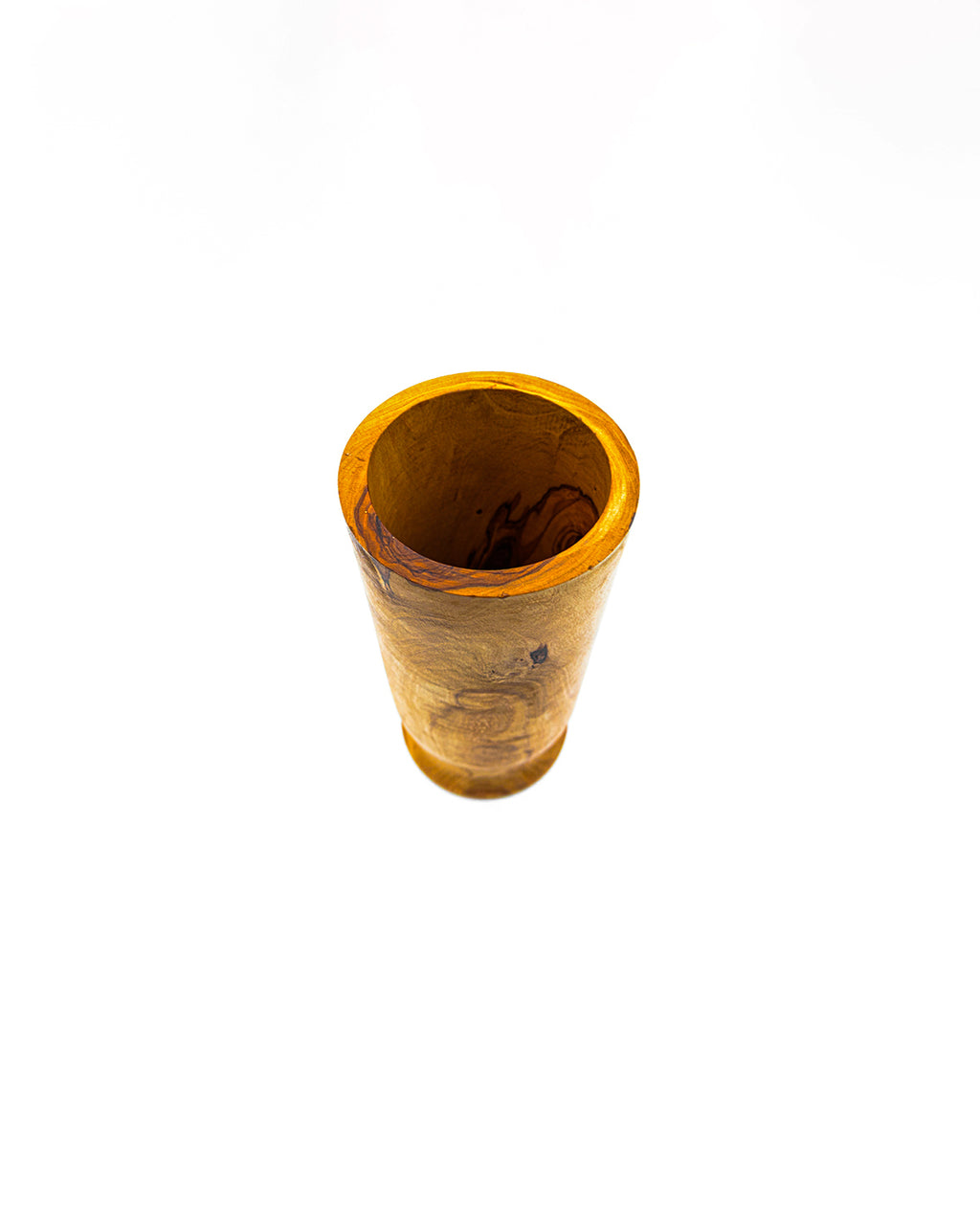 High-angle view of an olive wood kitchen crock showing the wide opening for easy storage of spoons and spatulas.