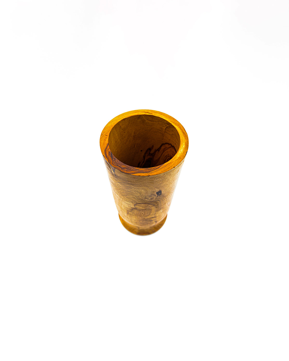 High-angle view of an olive wood kitchen crock showing the wide opening for easy storage of spoons and spatulas.